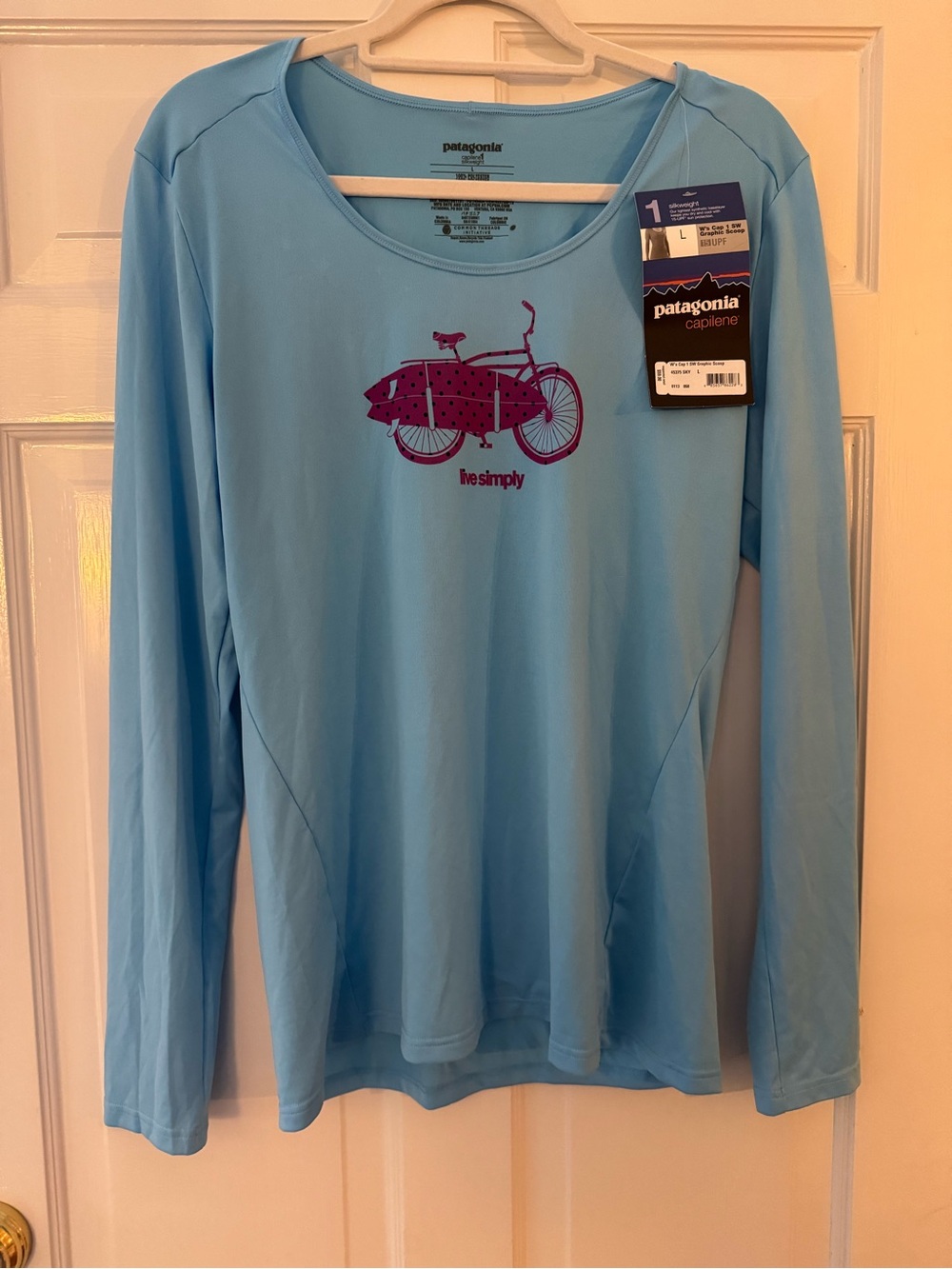 Patagonia Light Blue Capilene Long-Sleeve Tee with Pink Bike Print